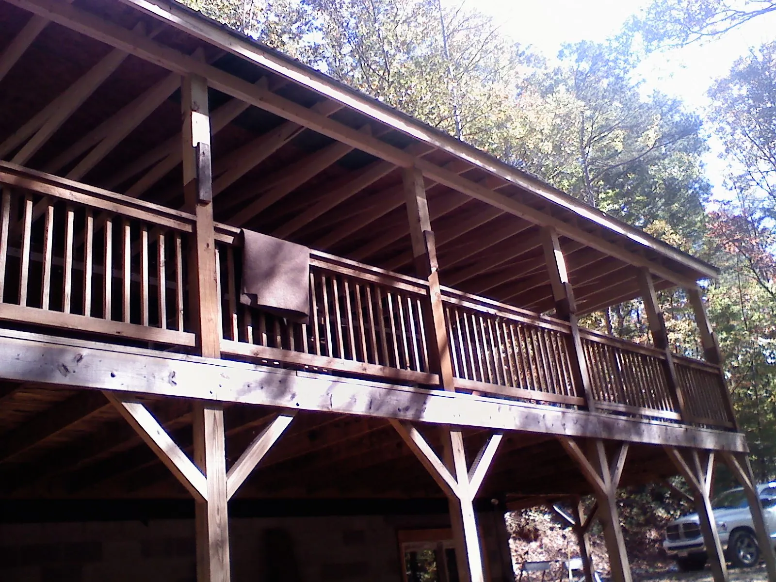 Timber framing under a new elevated porch and deck — Roof Leak Repair in Harpster by Roofing Brothers